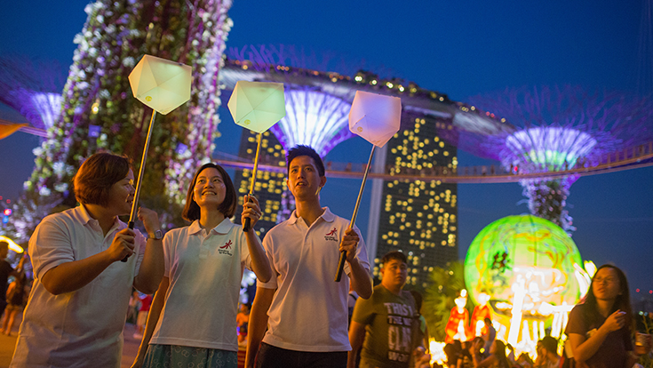 Gardens by the Bay staff showcasing the interactive lantern powered by a smartphone app, which plays an important role in the Gardens’ first-ever interactive lantern procession – one of the key highlights of this year’s Mid-Autumn celebrations.
