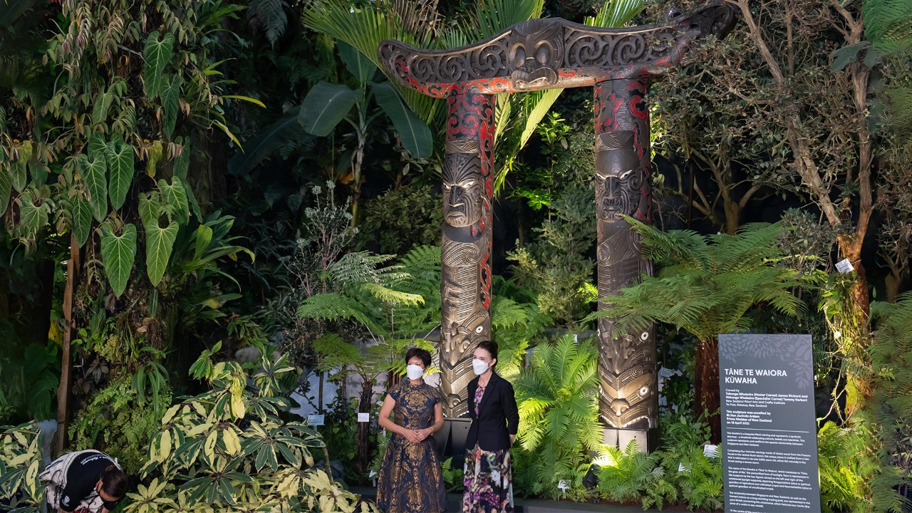  Minister in the Prime Minister’s Office Indranee Rajah and Prime Minister of New Zealand Jacinda Ardern pose for a photo after the kūwaha sculpture is unveiled at Gardens by the Bay’s Cloud Forest.