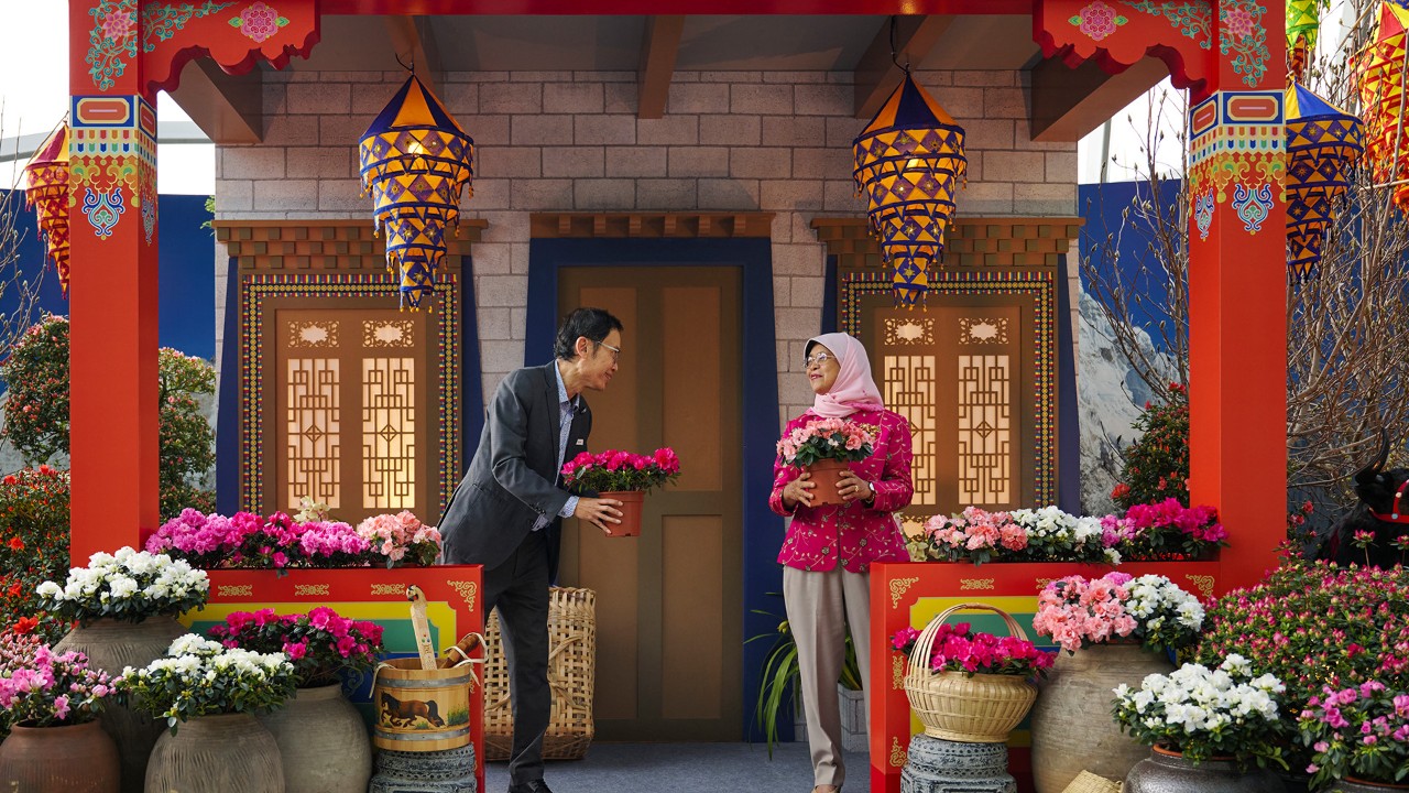 Gardens by the Bay CEO Mr Felix Loh and Guest-of-Honour Chancellor of the Singapore University of Social Sciences Madam Halimah Yacob officially open Azaleas of Shangri-La at Gardens by the Bay’s Cloud Forest by putting in place pots of azaleas.